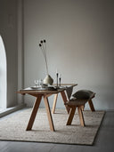 Hemp wool stripe rug 170x240 with a table and a bench